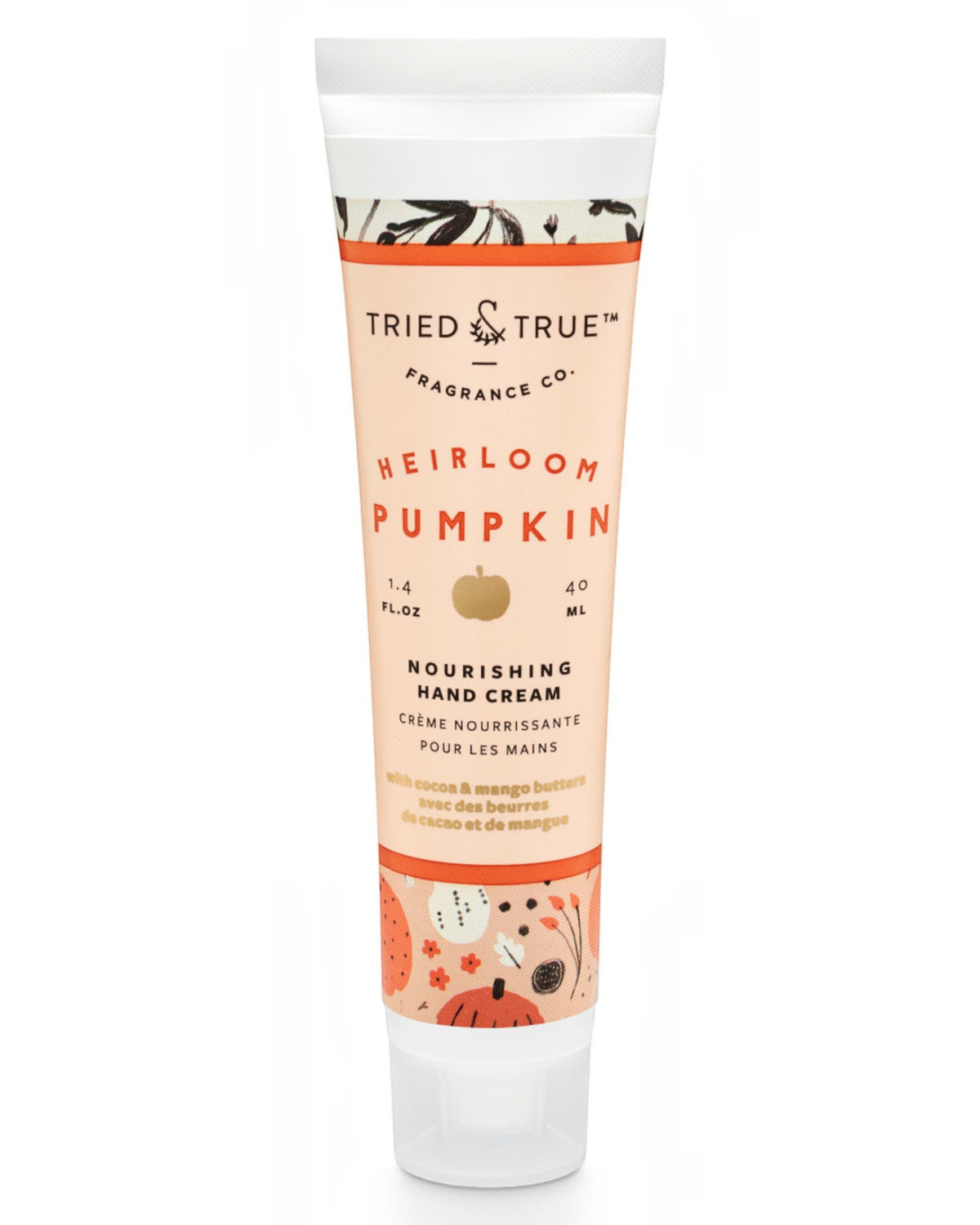 A squeeze tube of Tried & True Fragrance Co. Heirloom Pumpkin Nourishing Hand Cream, featuring a peach and orange label with pumpkin illustrations, set against a plain white background.