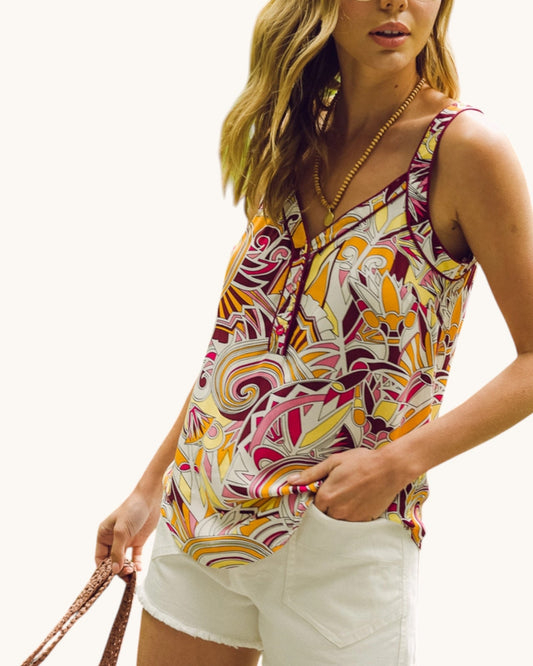 Fuschia Mosaic Abstract Tank Top paired with white denim shorts.