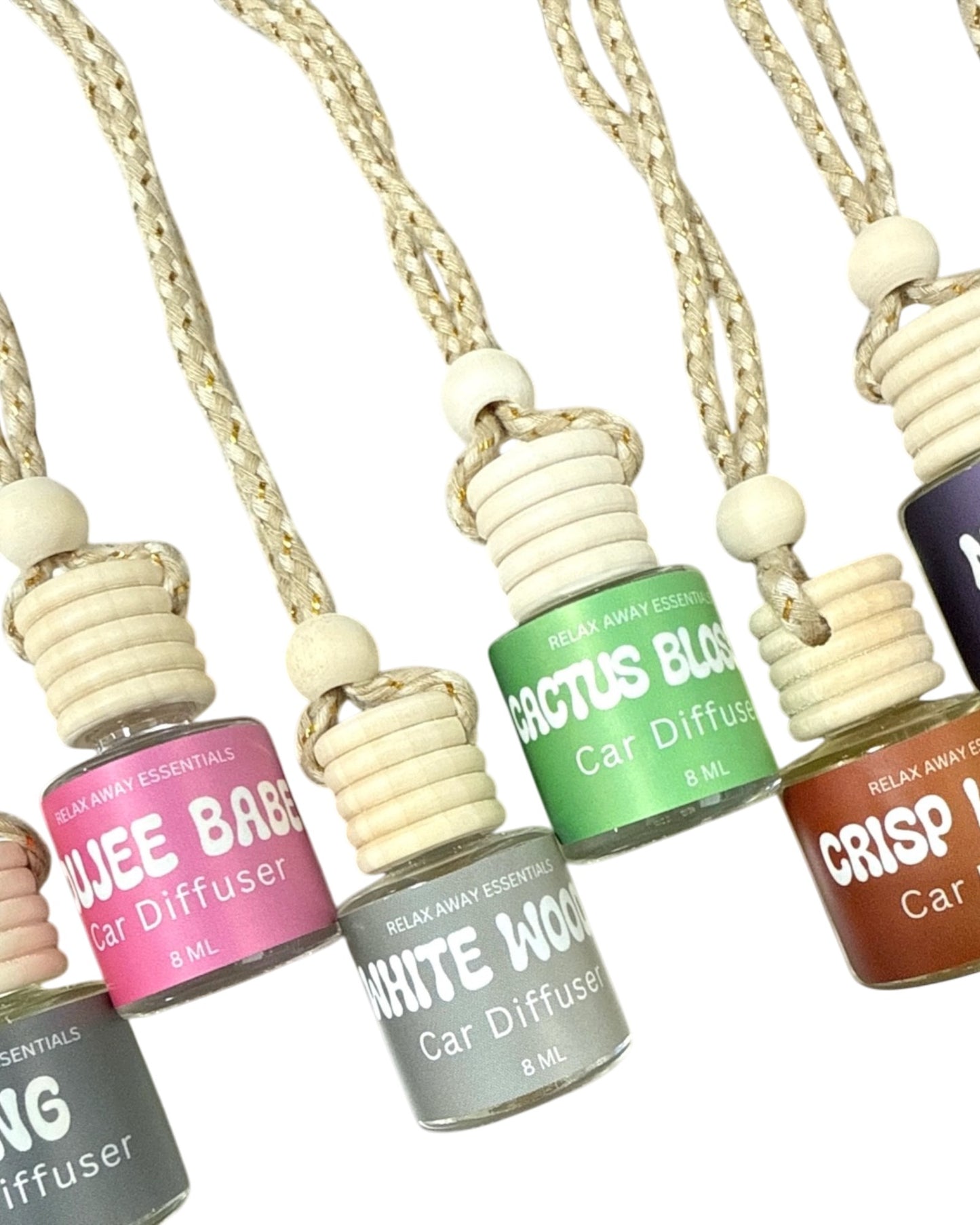 Collection of car diffusers with various scents on a white background.