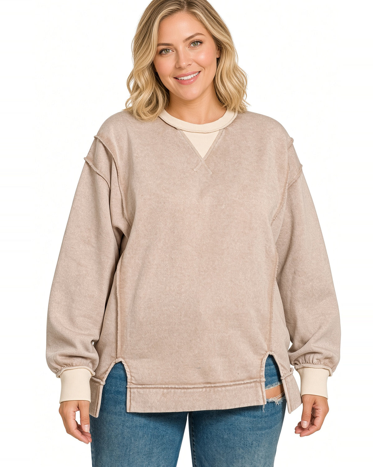 Plus size model wearing a light Ash Mocha crew neck sweatshirt with contrast light beige collar/cuffs and raw hem.