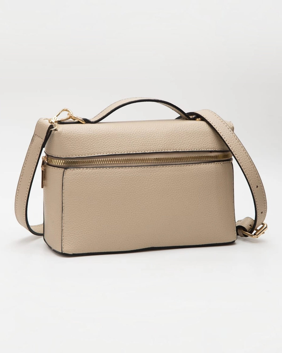 Beige Top Handle Crossbody Pebbled Faux Leather Handbag with adjustable and removable shoulder strap and gold hardware.