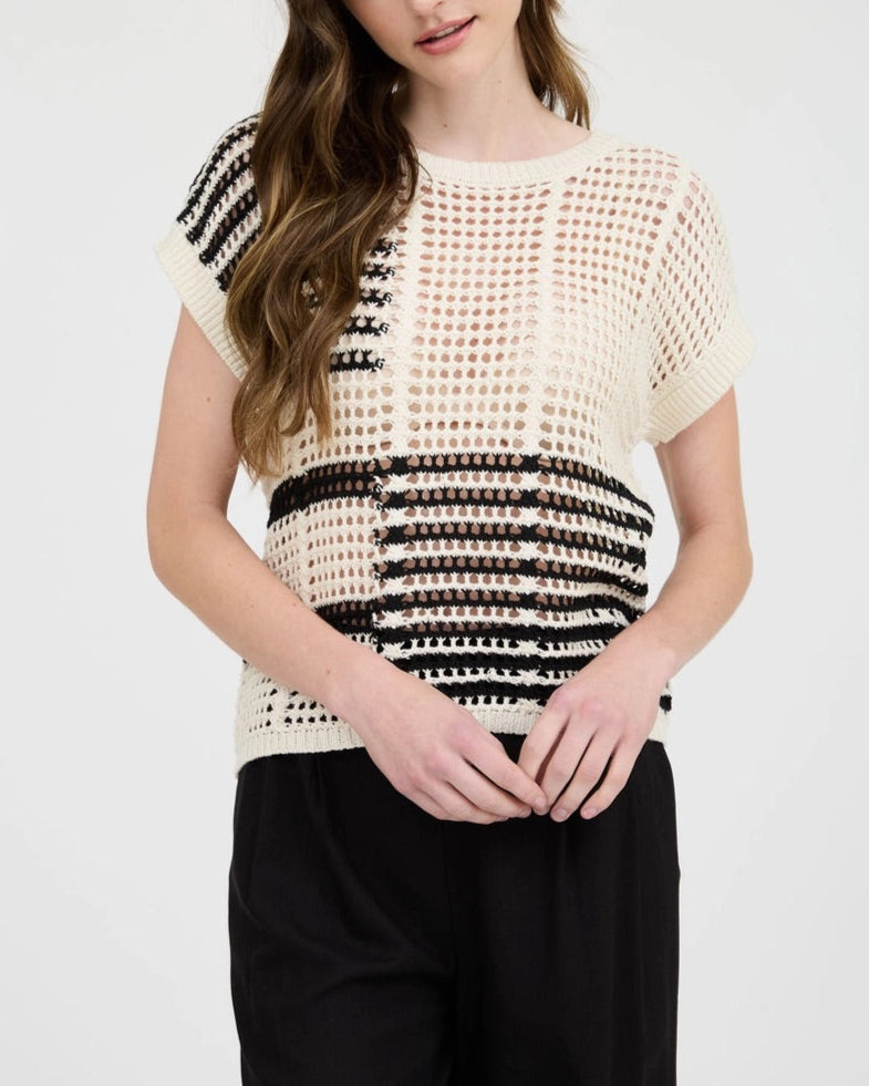 Black and cream sheer crochet short sleeve top with relaxed fit.