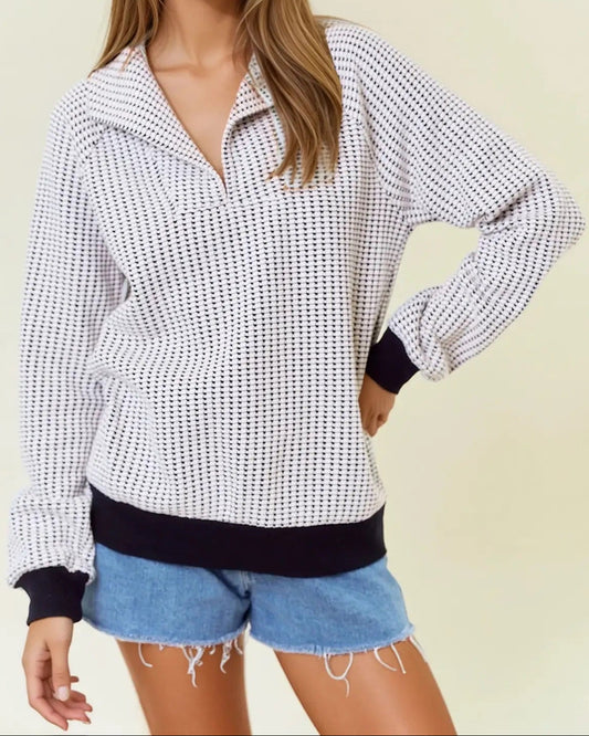 Two-tone black and white cotton waffle collared sweatshirt.