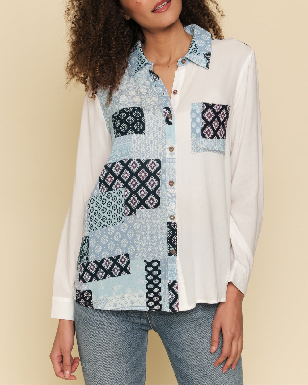 White and blue mixed print button-down shirt.