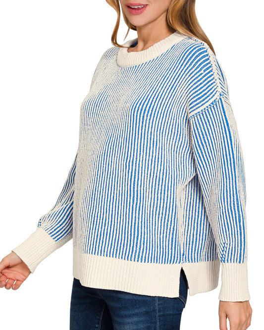 Woman wearing Blue and Ivory Two Tone Striped Crew Neck Sweater.