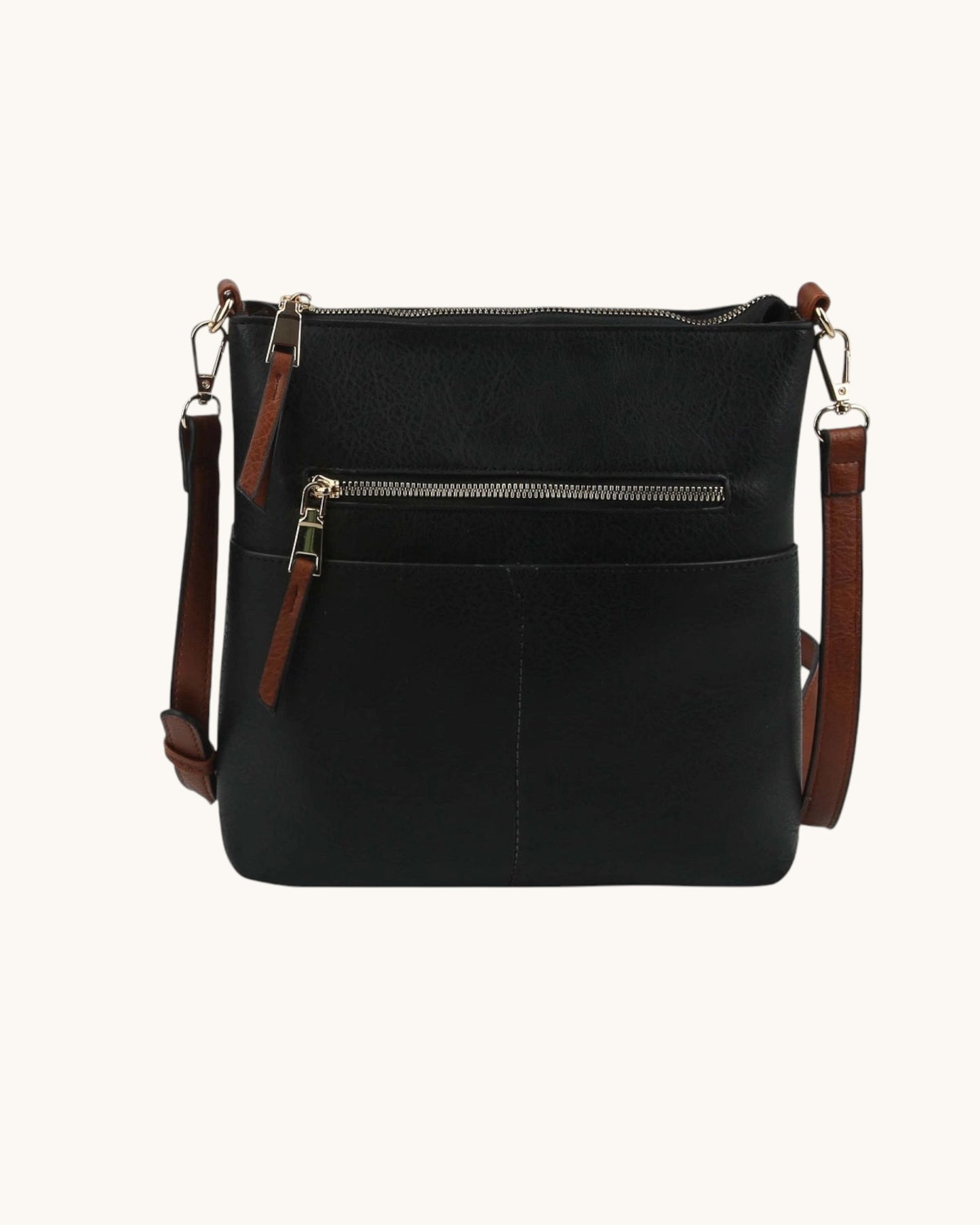 Black crossbody handbag with brown straps on a white background.