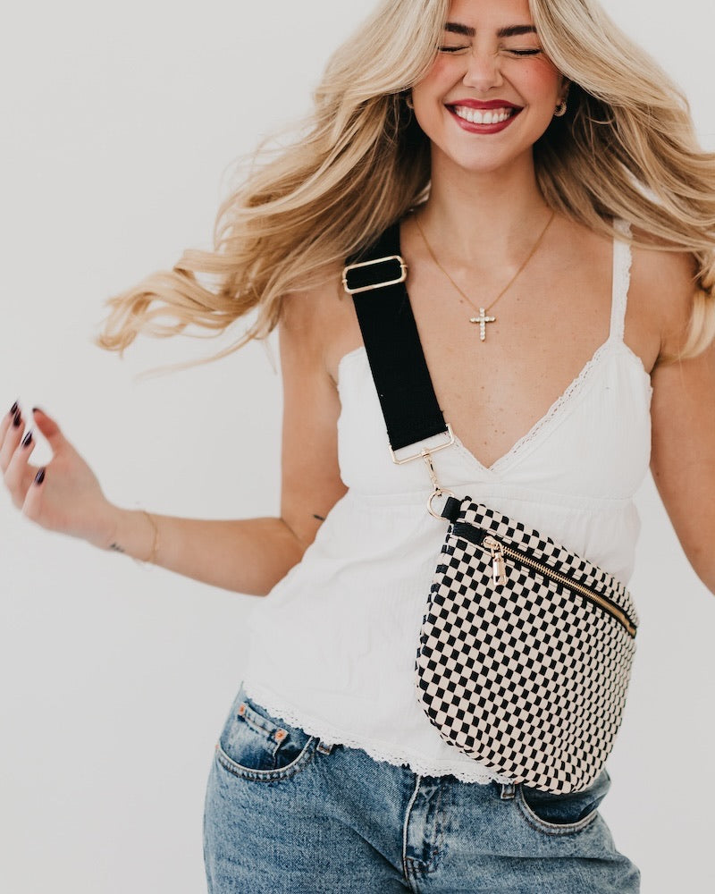 Cream and black woven vegan leather crossbody / bum bag with gold hardware.