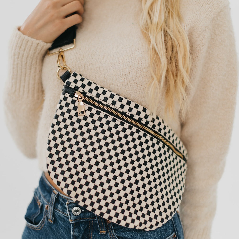 Cream and black woven vegan leather crossbody / bum bag with gold hardware.