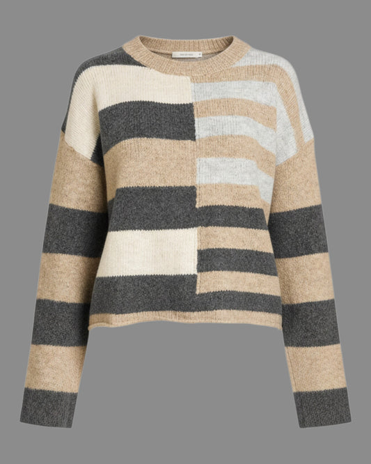A semi cropped knit sweater with wide horizontal stripes in beige, charcoal gray, cream, and light gray, shown against a solid gray background.