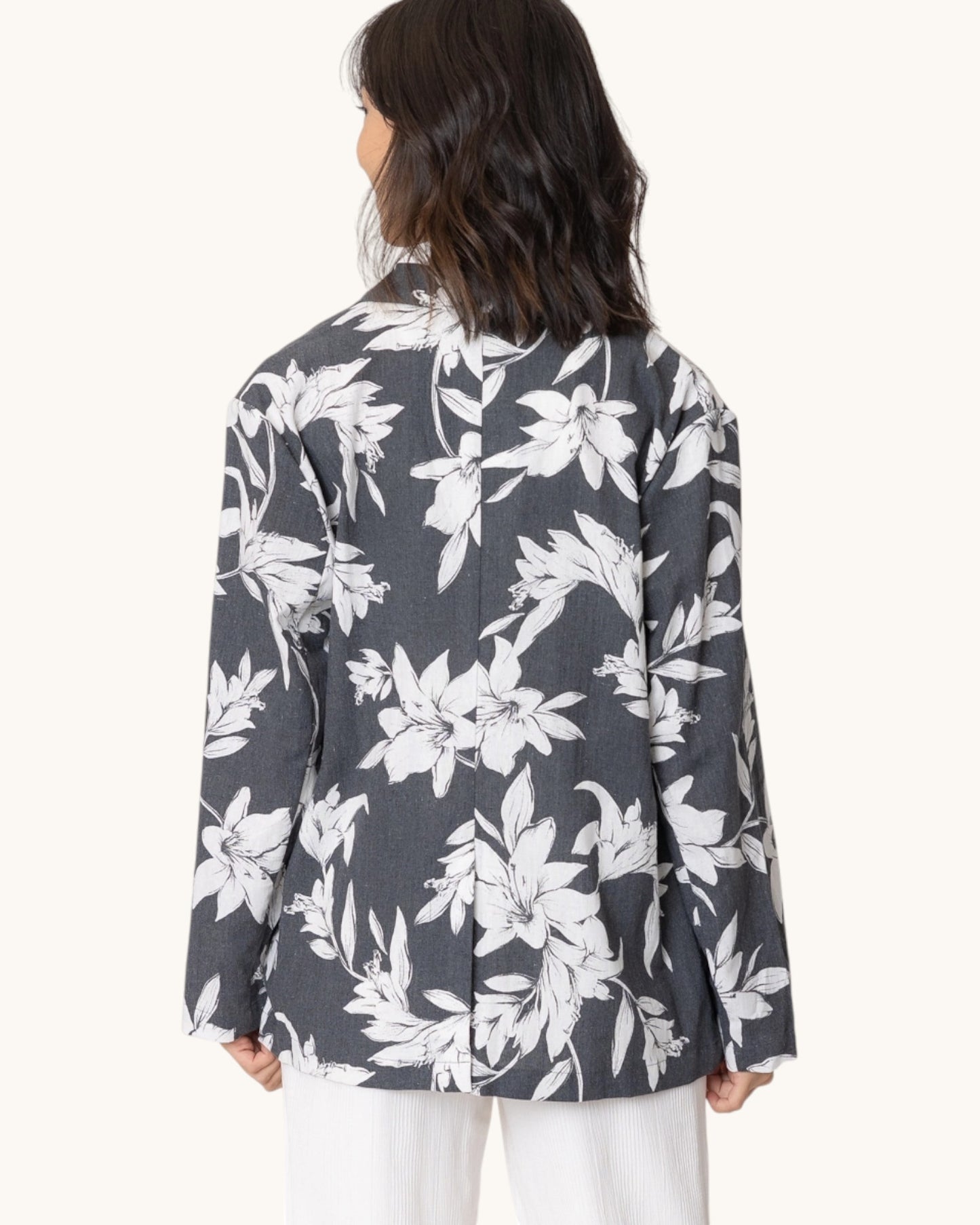 Back view of The Monroe Tropical Print Charcoal Blazer.