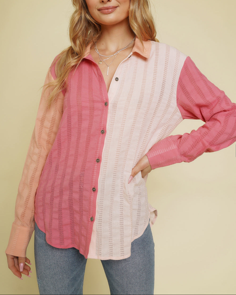 Peach and pink colorblock button-down shirt with embroidered stripes.