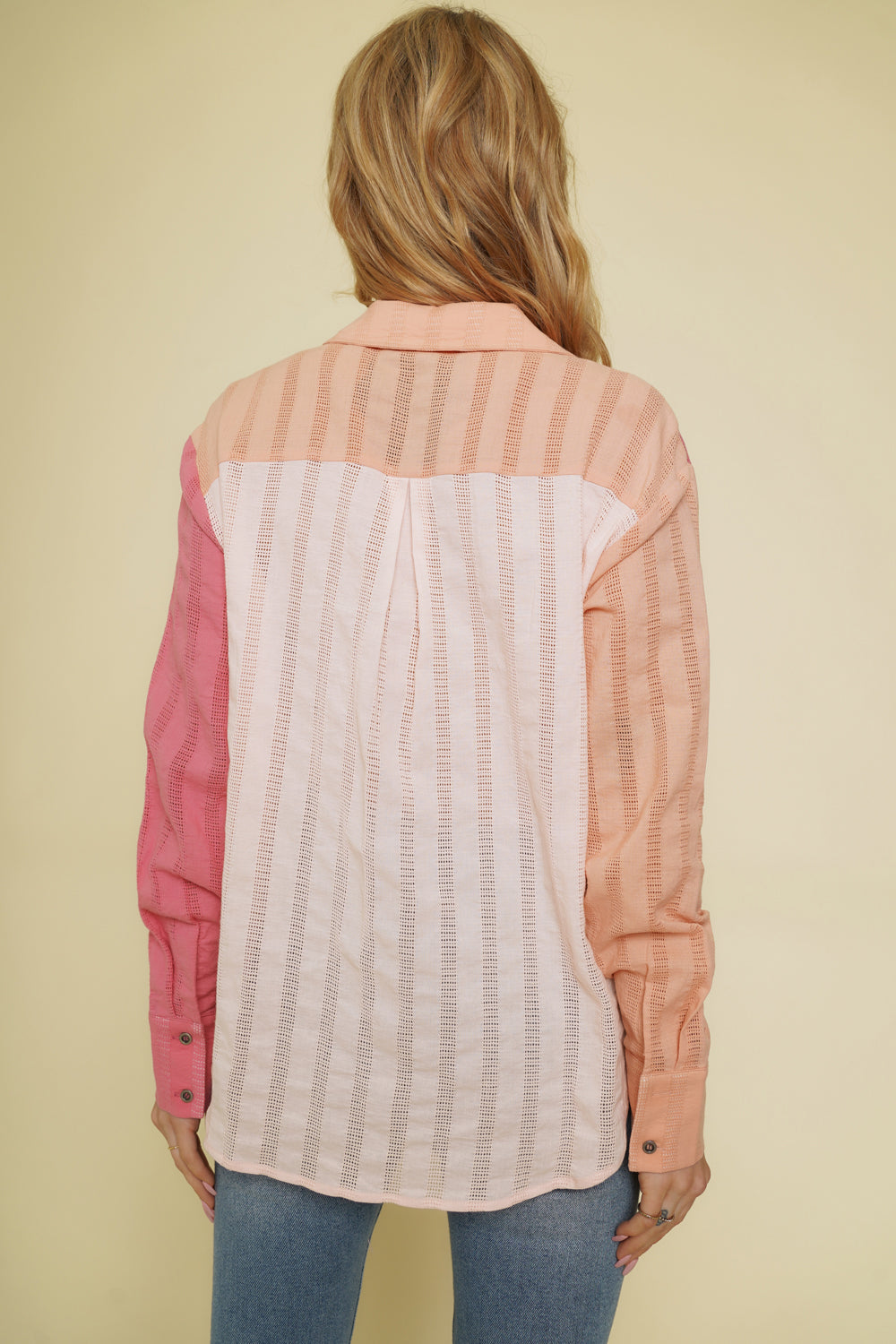Peach and pink colorblock button-down shirt with embroidered stripes.