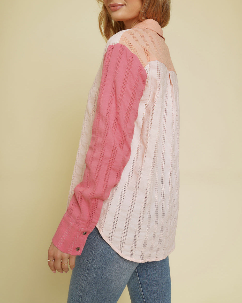 Peach and pink colorblock button-down shirt with embroidered stripes.