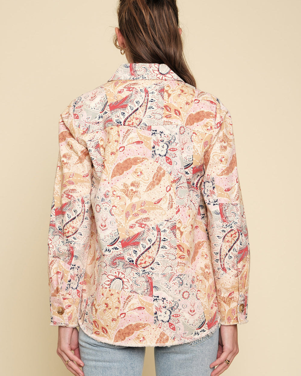 Paisley patchwork shacket with frayed hem and button-up front.