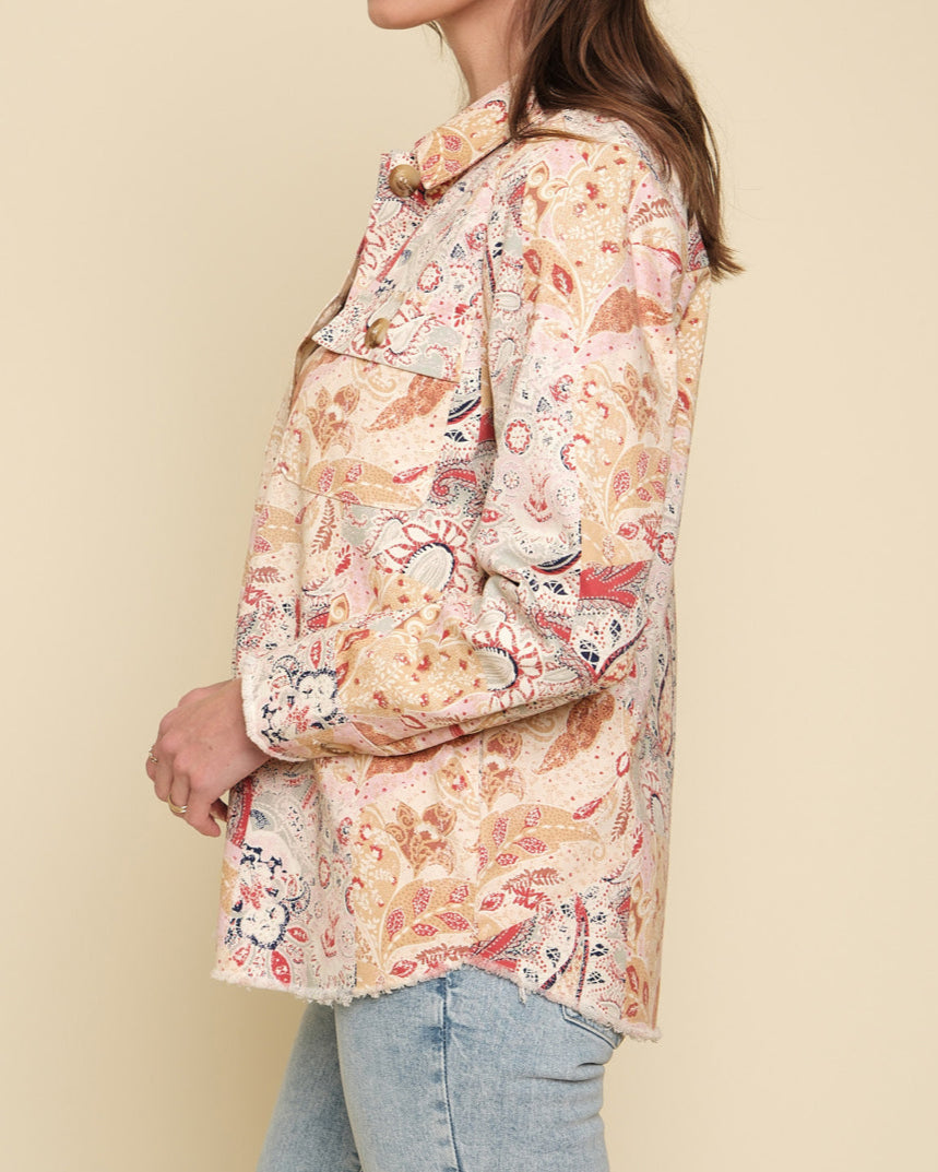 Paisley patchwork shacket with frayed hem and button-up front.