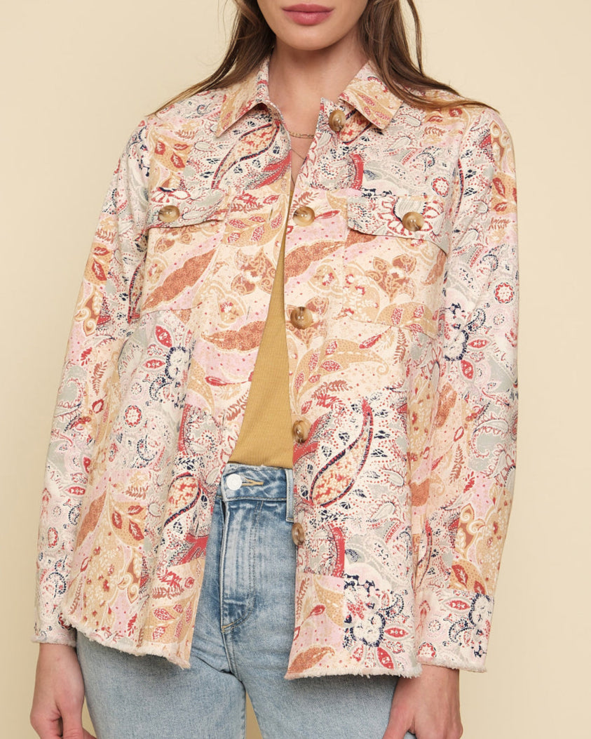 Paisley patchwork shacket with frayed hem and button-up front.