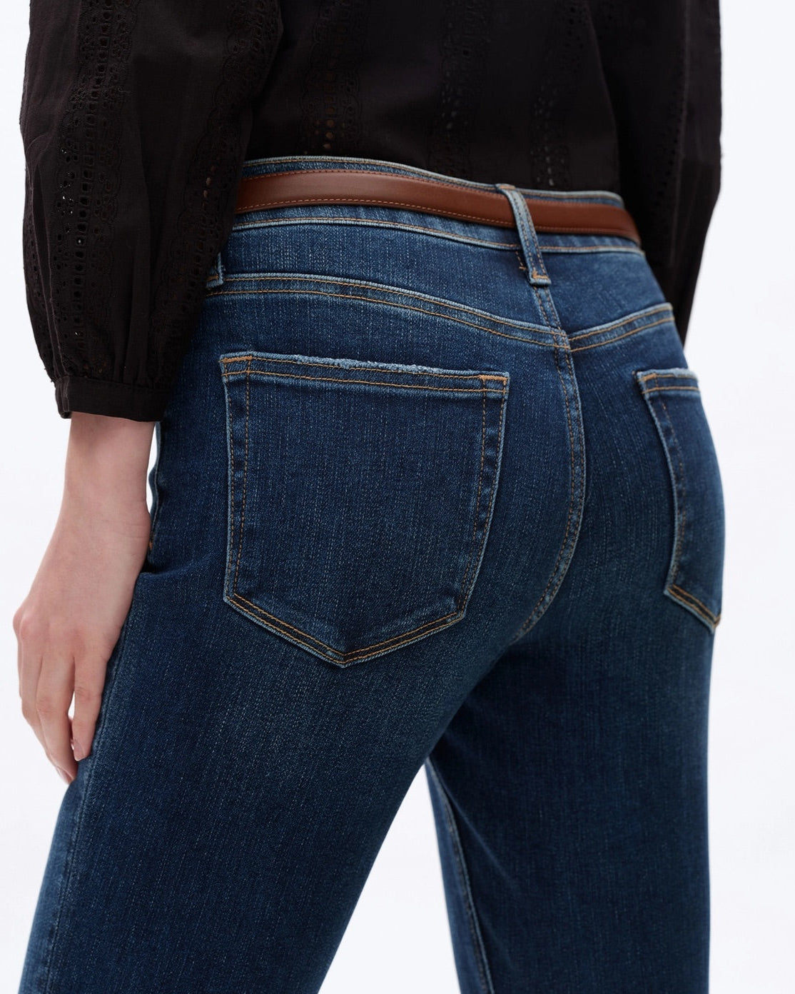 Mid-Rise Slim and Straight Super Stretch Jeans in Dark Blue with Finished Hem.
