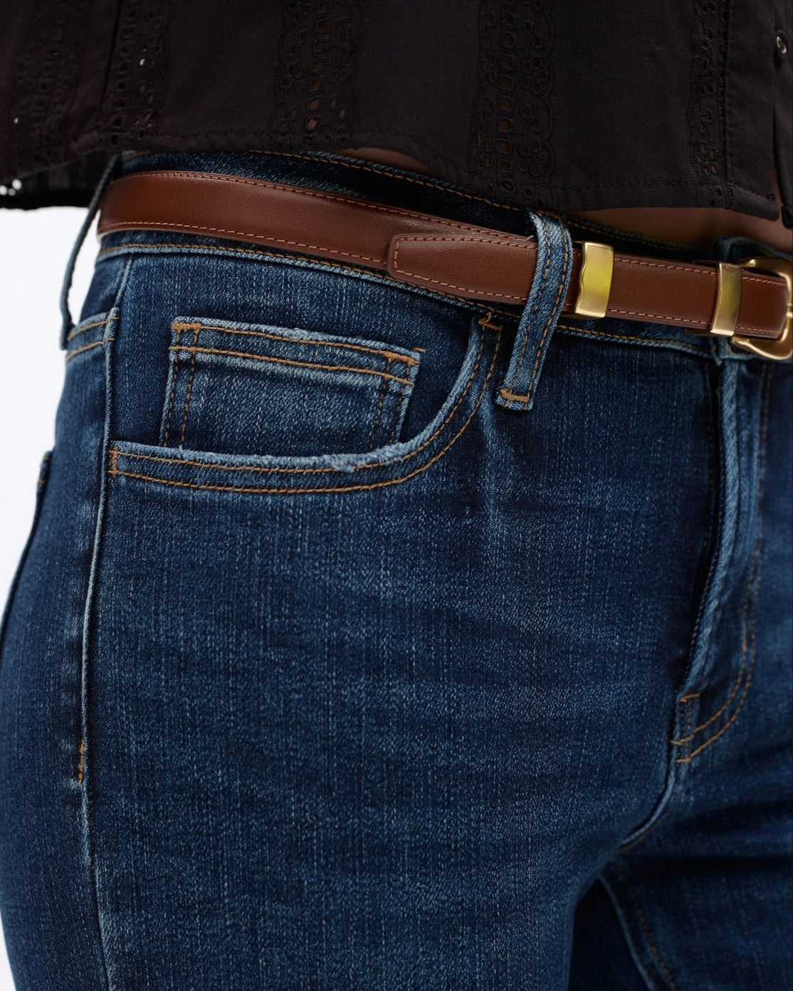 Mid-Rise Slim and Straight Super Stretch Jeans in Dark Blue with Finished Hem.