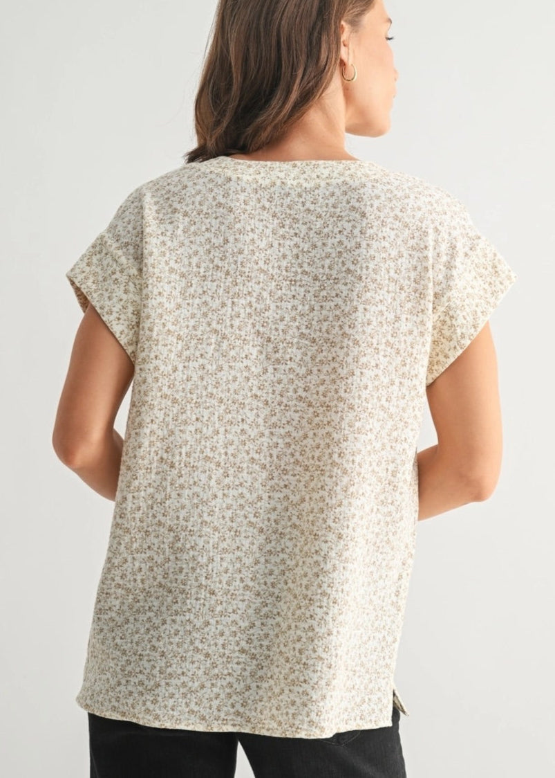 Cream short sleeve cotton blouse with delicate ditsy floral print