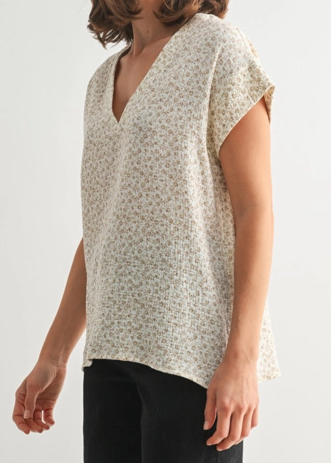Cream short sleeve cotton blouse with delicate ditsy floral print