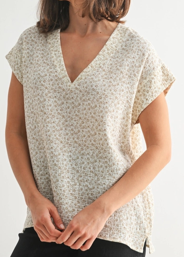 Cream short sleeve cotton blouse with delicate ditsy floral print