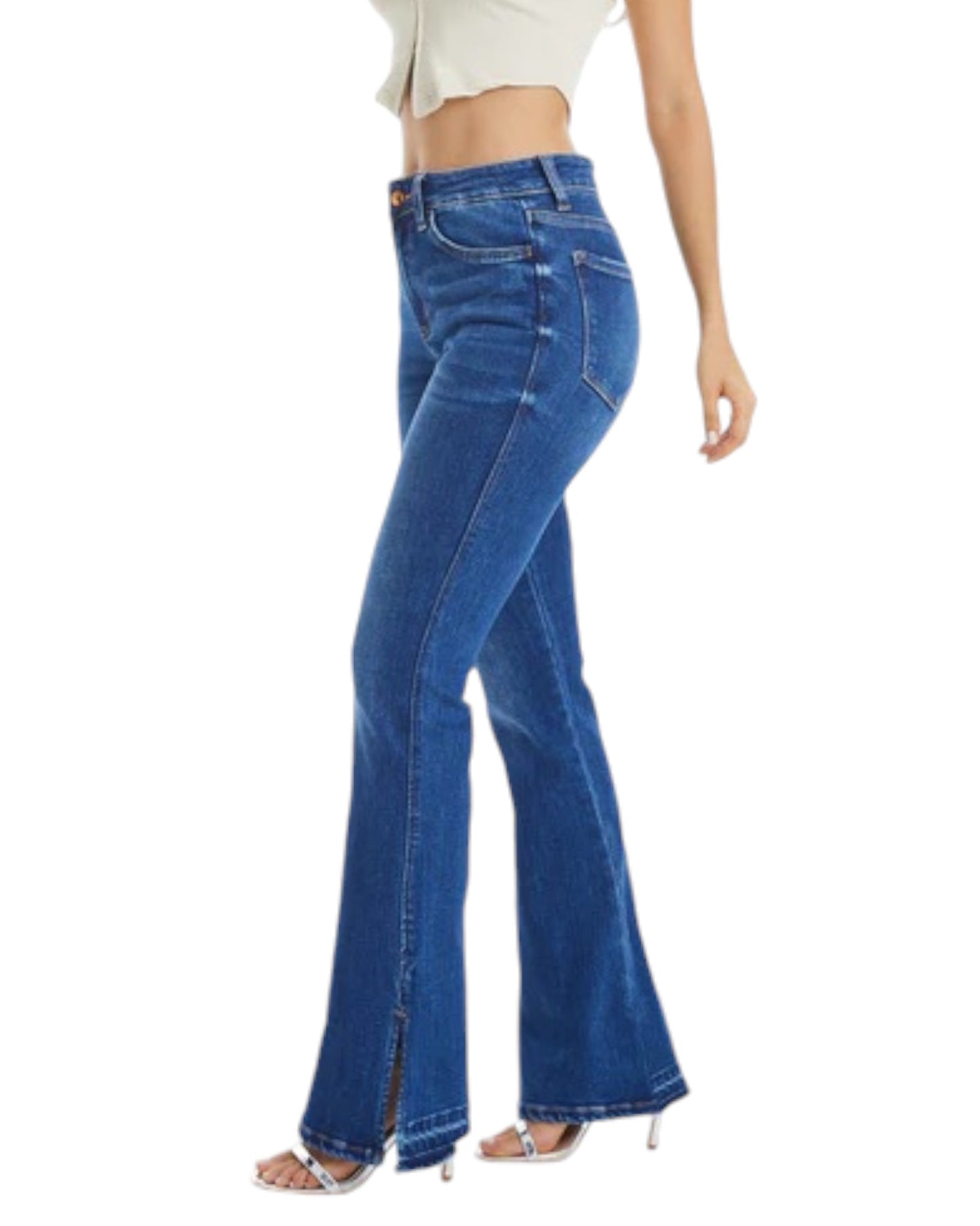 Woman wearing High-Rise Flare Jean with Side Slit in Medium Blue.
