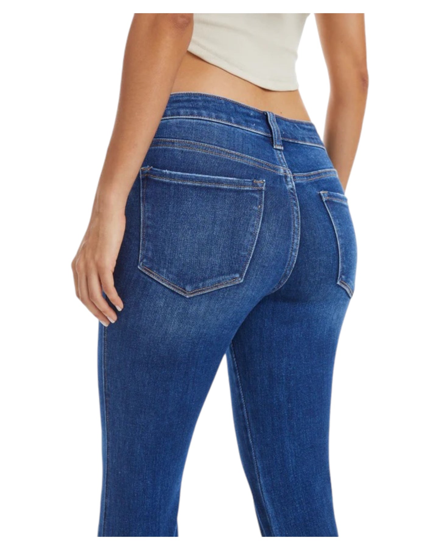 Woman wearing High-Rise Flare Jean with Side Slit in Medium Blue.