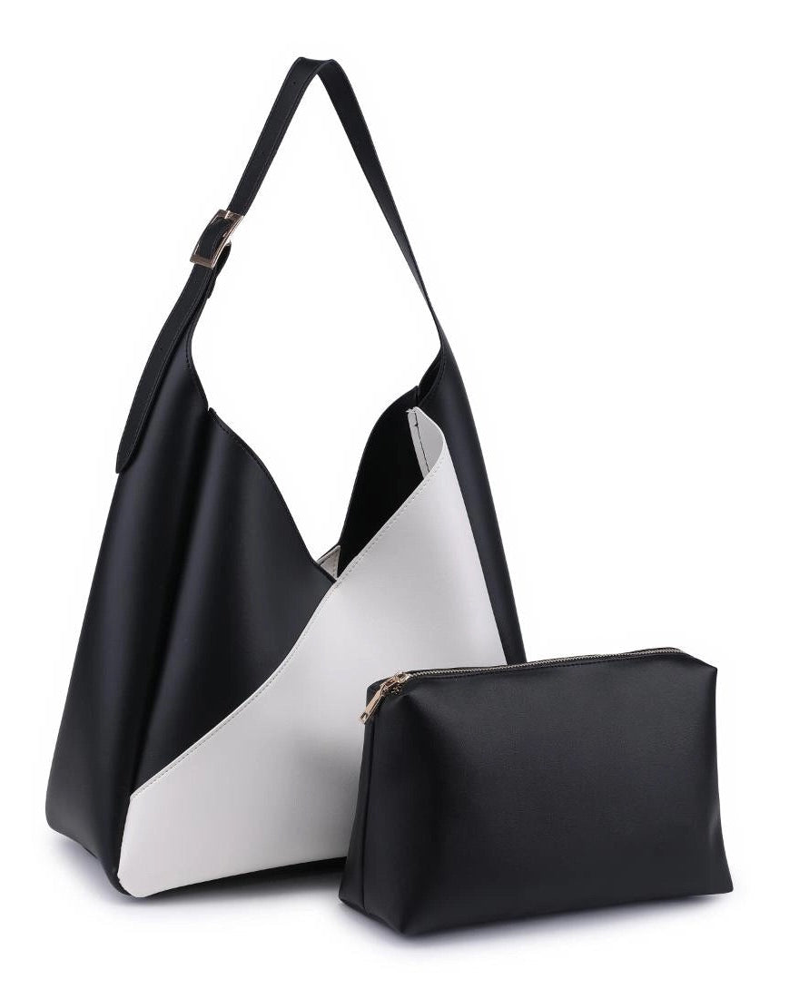 Black and white handbag with a matching pouch on a white background