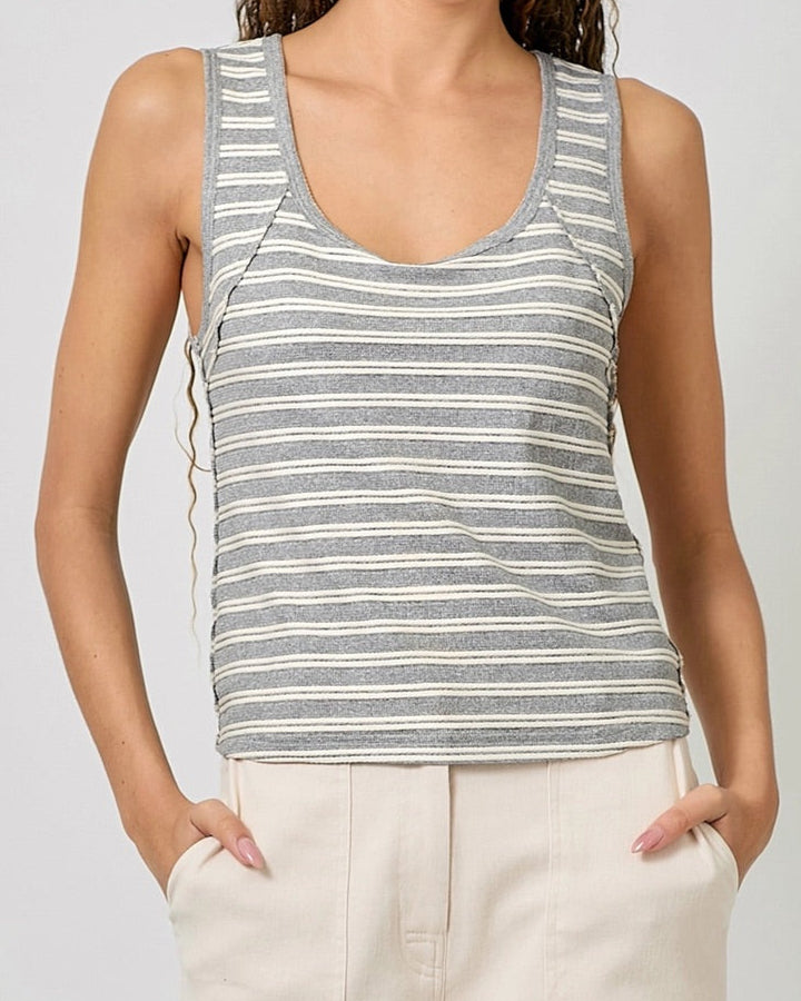 Grey and ivory striped tank top with scoop neck and raw edge seams.