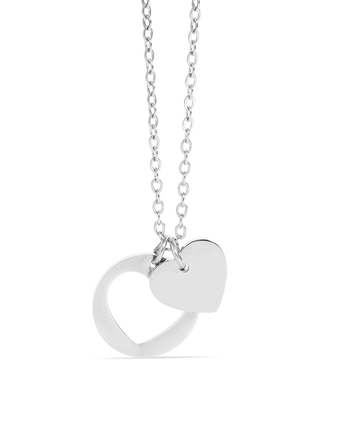 Silver heart-shaped pendant necklace on a white background.