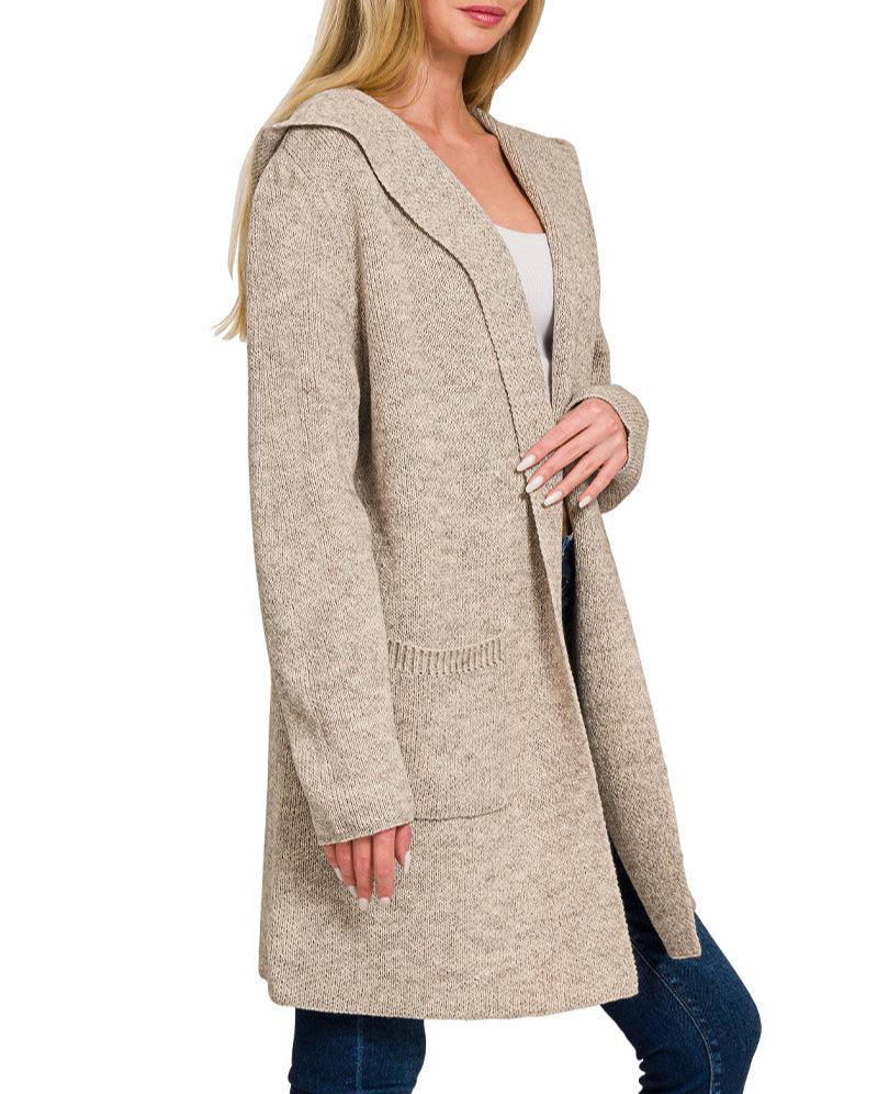 Woman wearing a Heather Mocha hooded open front cardigan with front pockets and mid-thigh length.