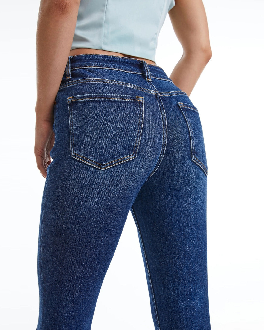 High-Rise Super Stretch Bootcut Jeans in Deep Sea Dark Blue.