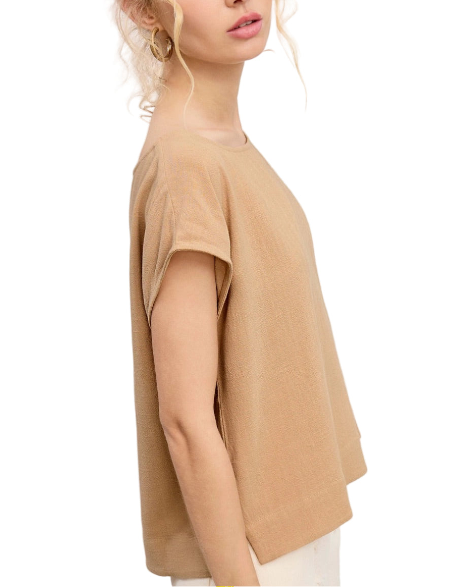 Woman wearing a Khaki linen-blend cap sleeve top with round neckline and side slits.