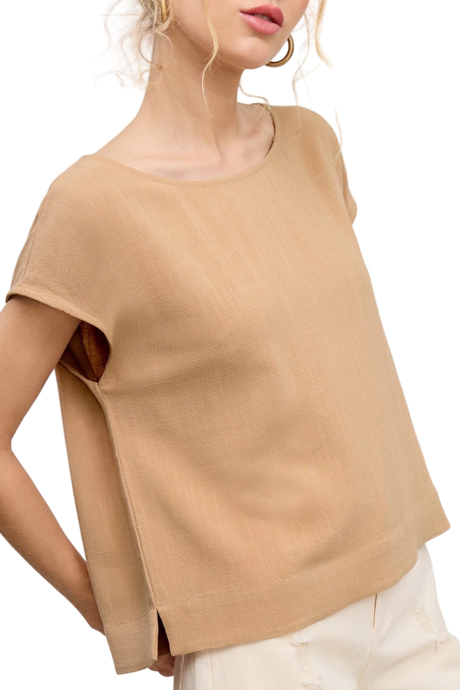 Woman wearing a Khaki linen-blend cap sleeve top with round neckline and side slits.