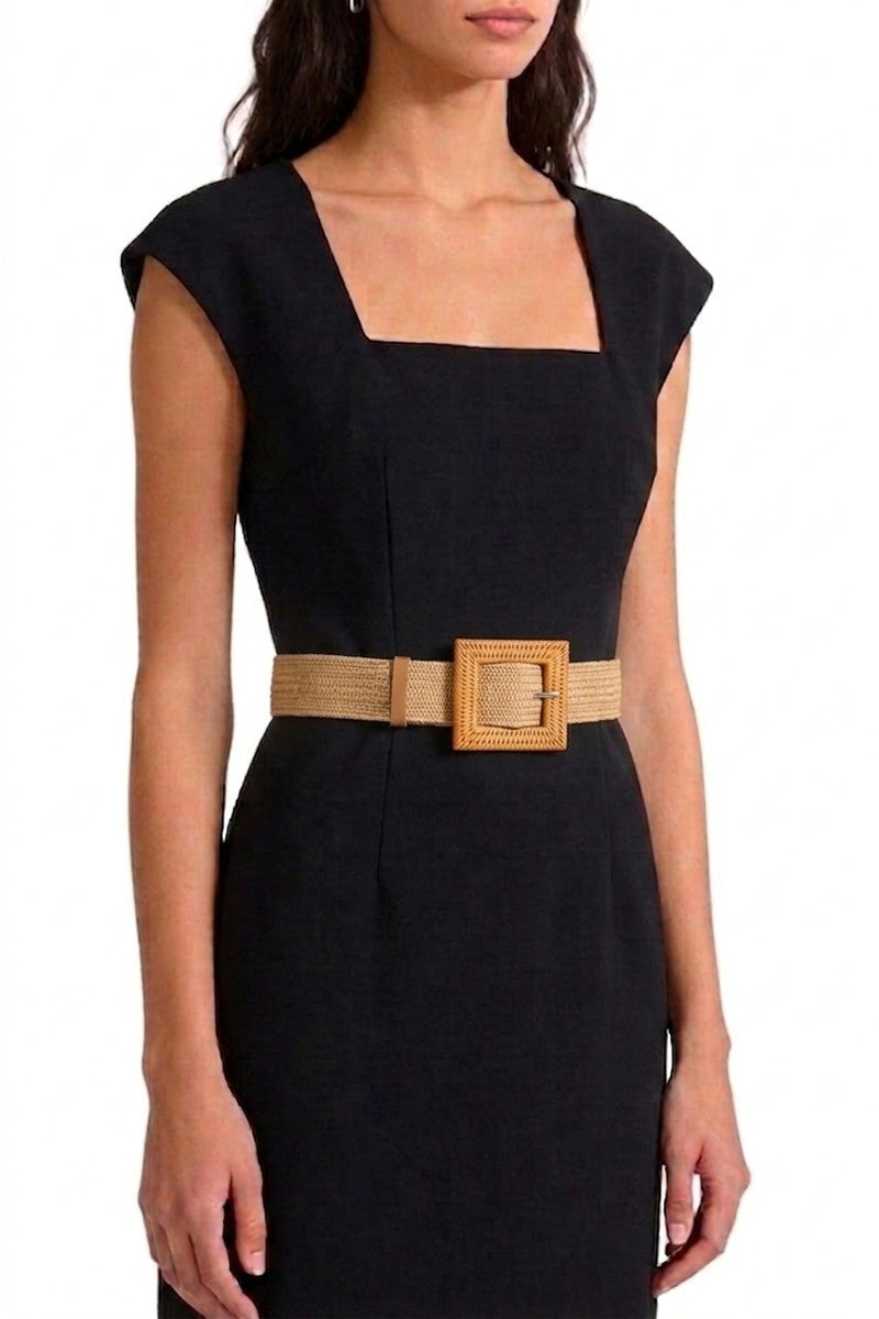 Woman in black dress wearing the camel Wanderlust Boho Adjustable Buckle Belt.