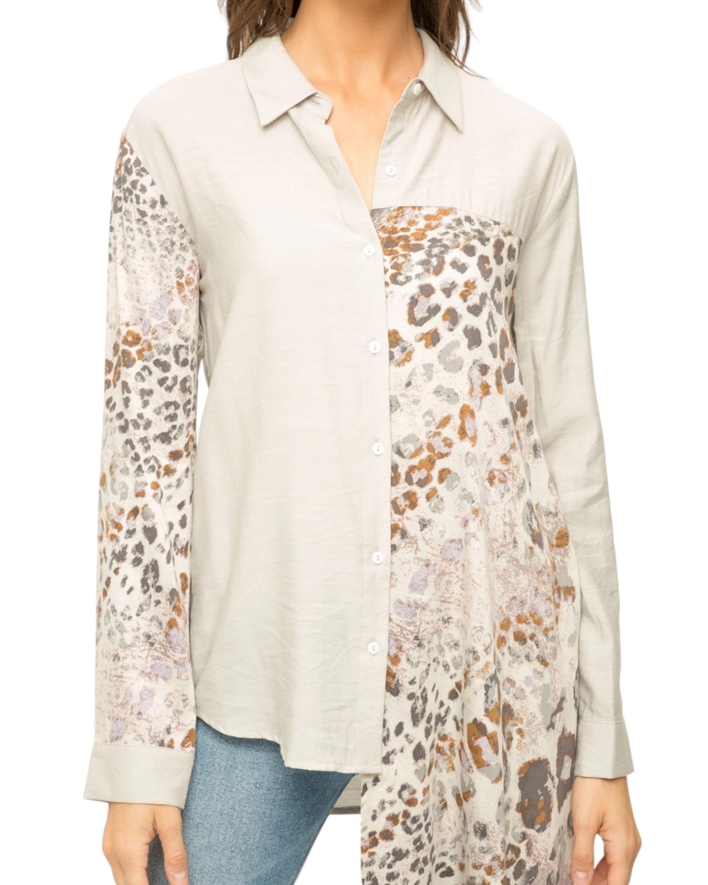 Leopard Luxe High-Low Button-Up Top with scarf-style leopard print inset, long sleeves, and asymmetrical hem in neutral tones.