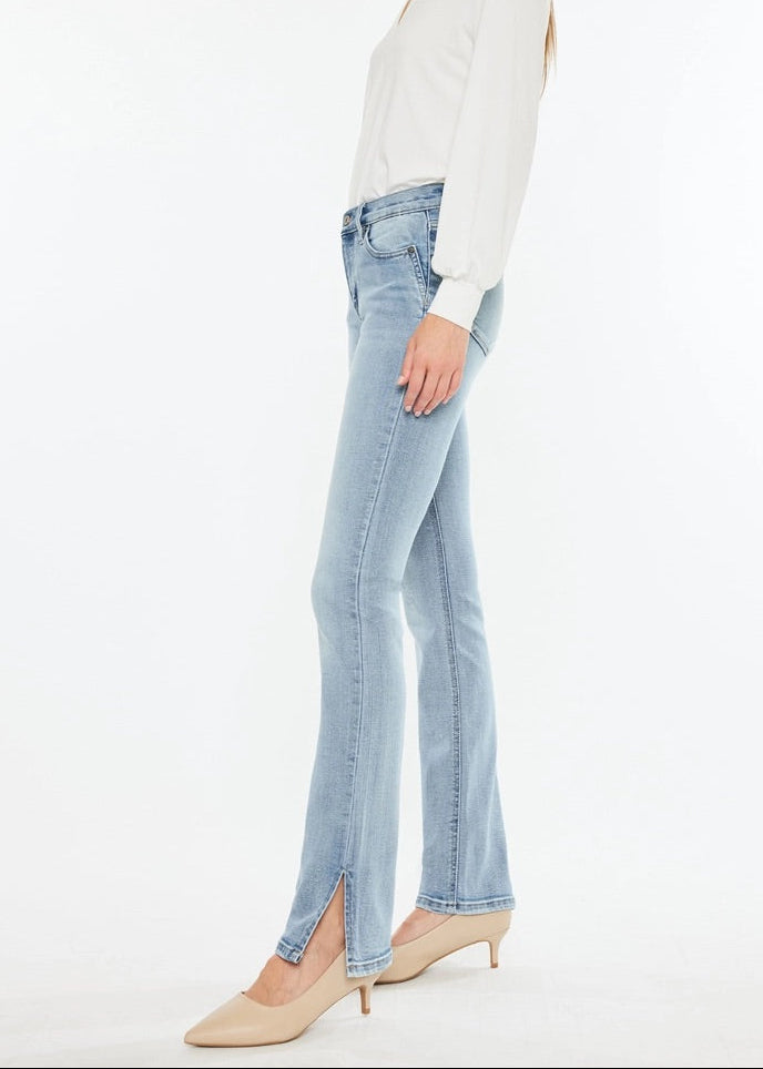 Kan Can Mid-Rise Split Hem Medium Wash Bootcut Jeans with flattering fit and side slit hem.