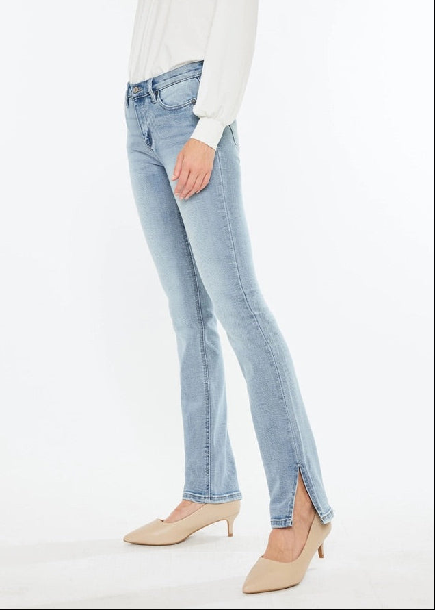 Kan Can Mid-Rise Split Hem Medium Wash Bootcut Jeans with flattering fit and side slit hem.