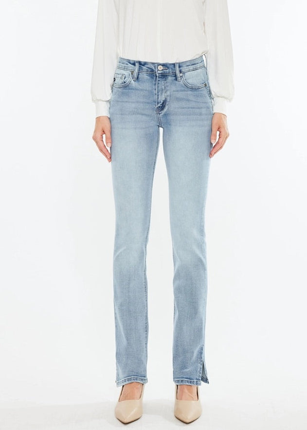 Kan Can Mid-Rise Split Hem Medium Wash Bootcut Jeans with flattering fit and side slit hem.