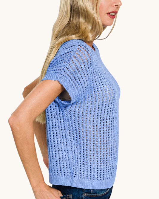 Open knit crochet short sleeve top in cornflower blue (side profile).