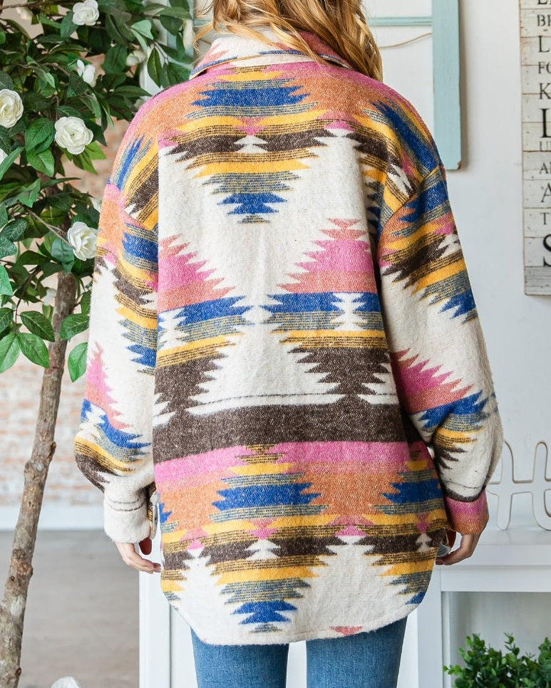 Ivory shacket with multicolor Southwest pattern and oversized fit.