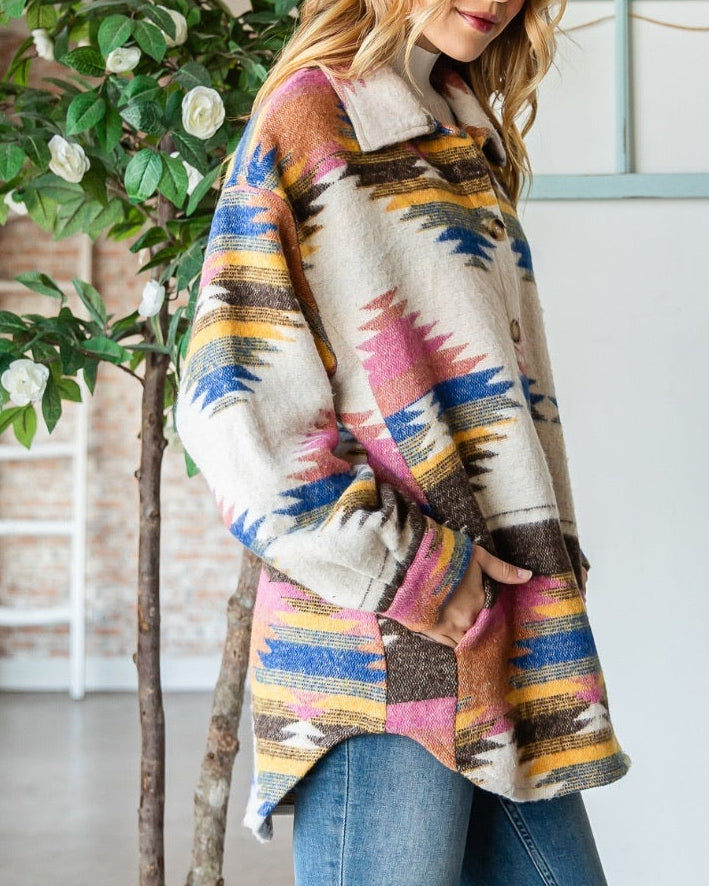 Ivory shacket with multicolor Southwest pattern and oversized fit.