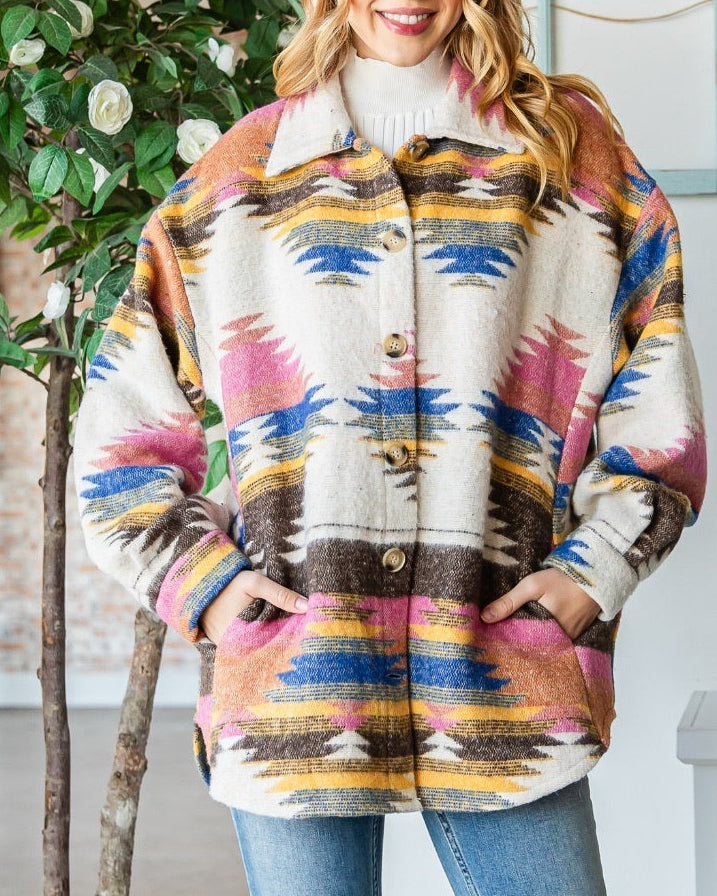 Ivory shacket with multicolor Southwest pattern and oversized fit.