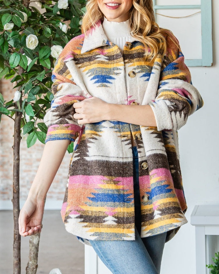 Ivory shacket with multicolor Southwest pattern and oversized fit.