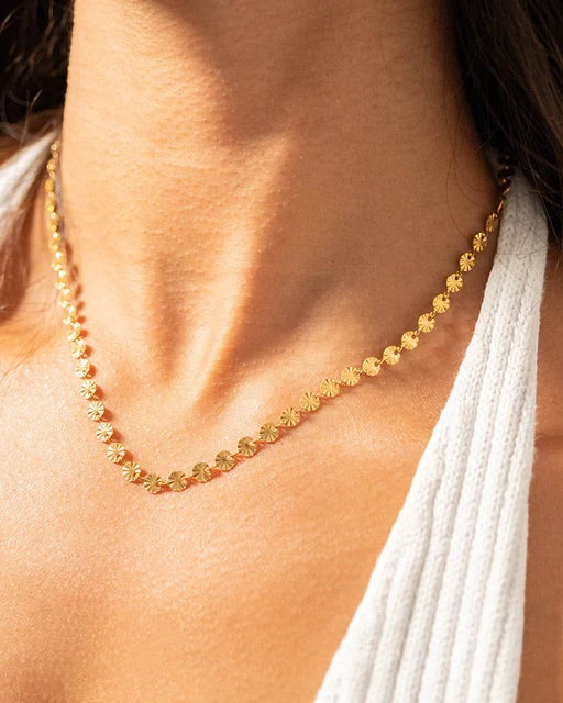 Waterproof Gold sunburst necklace.
