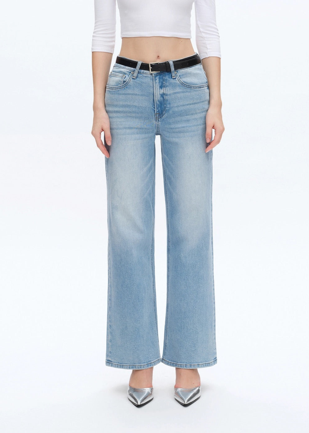 Woman wearing Wide Straight Leg Comfort Stretch Jeans in Swiss Blue with a Black Belt.
