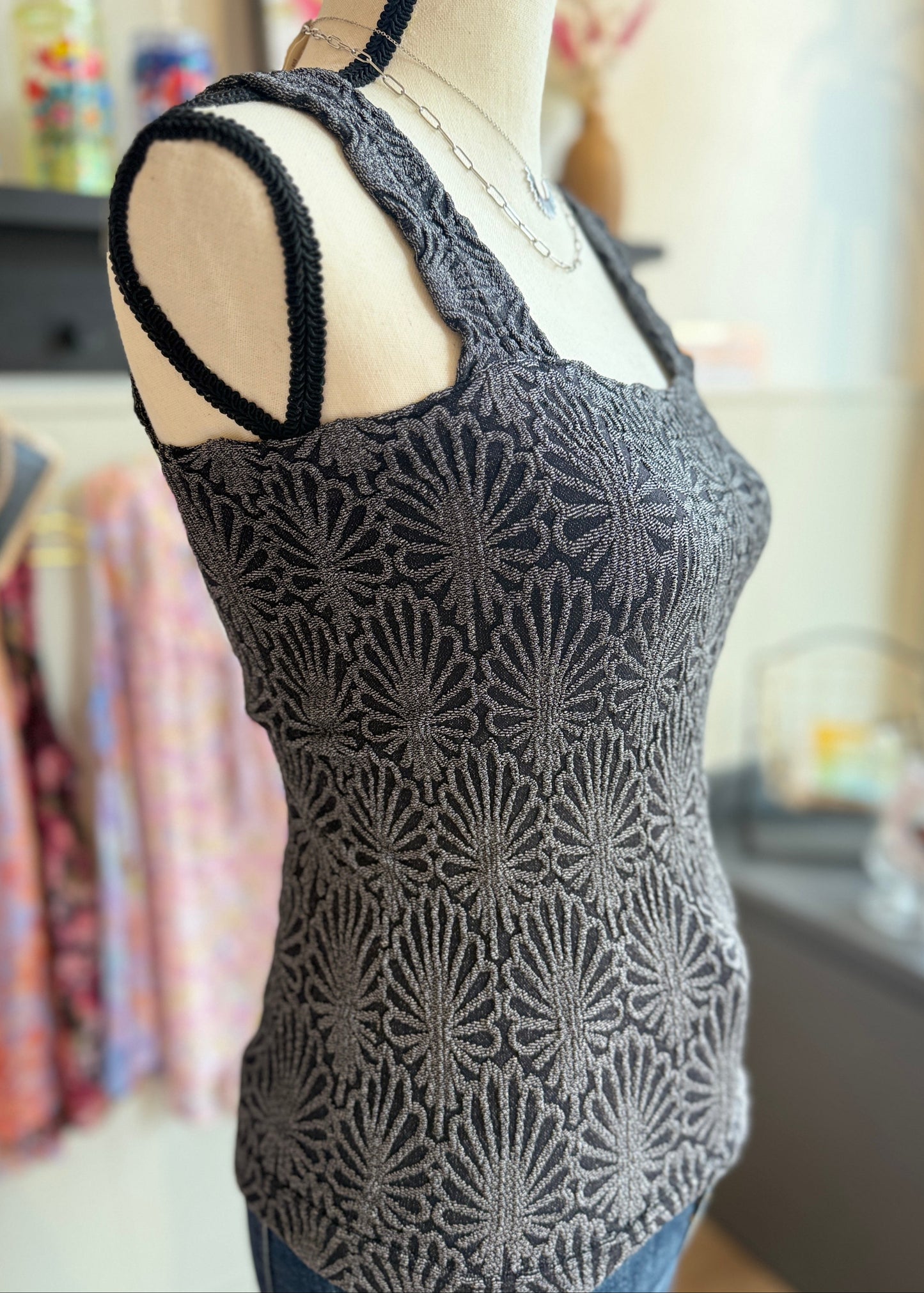 Charcoal fitted tank top with floral texture, square neckline and stretchy knit.