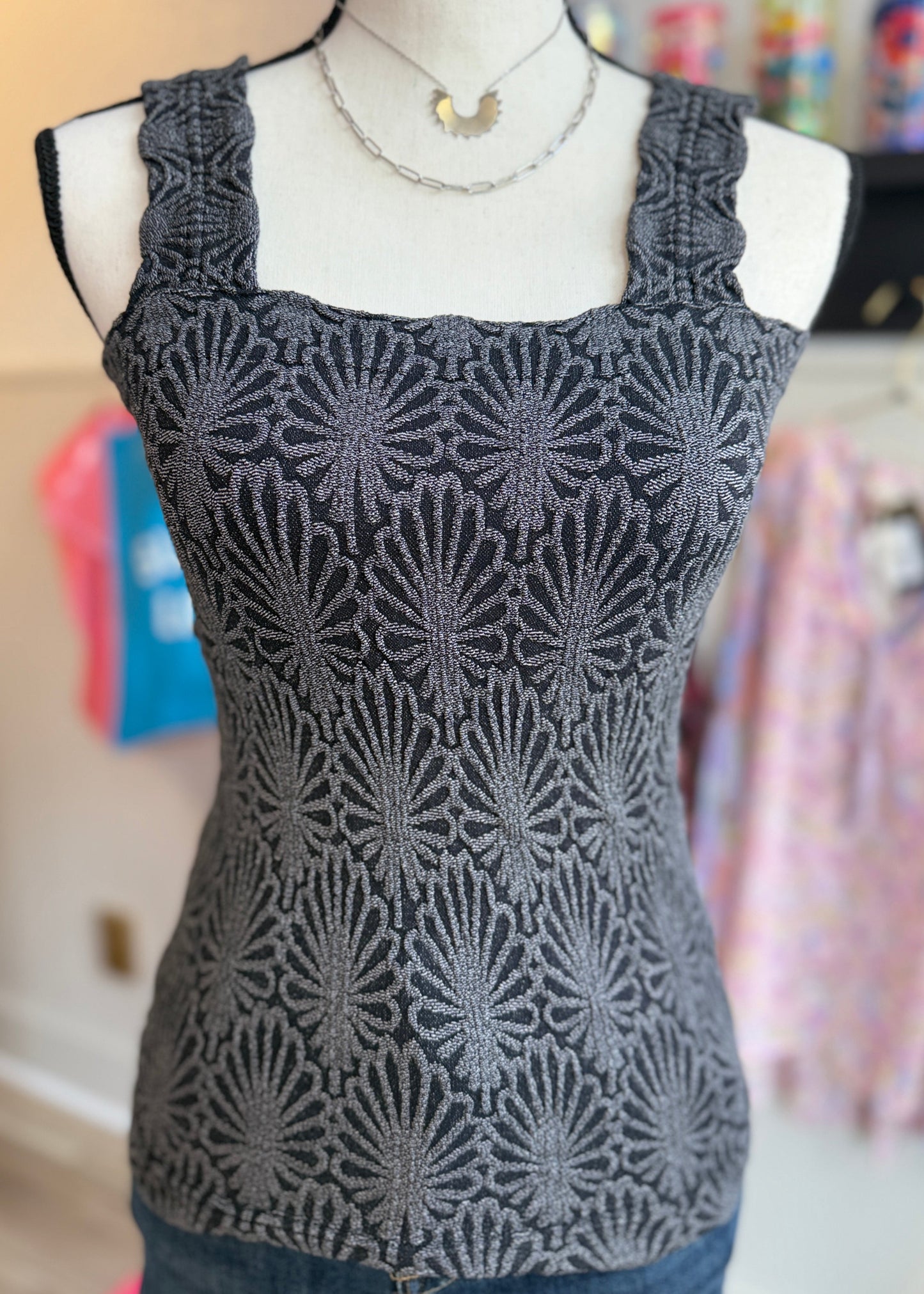 Charcoal fitted tank top with floral texture, square neckline and stretchy knit.