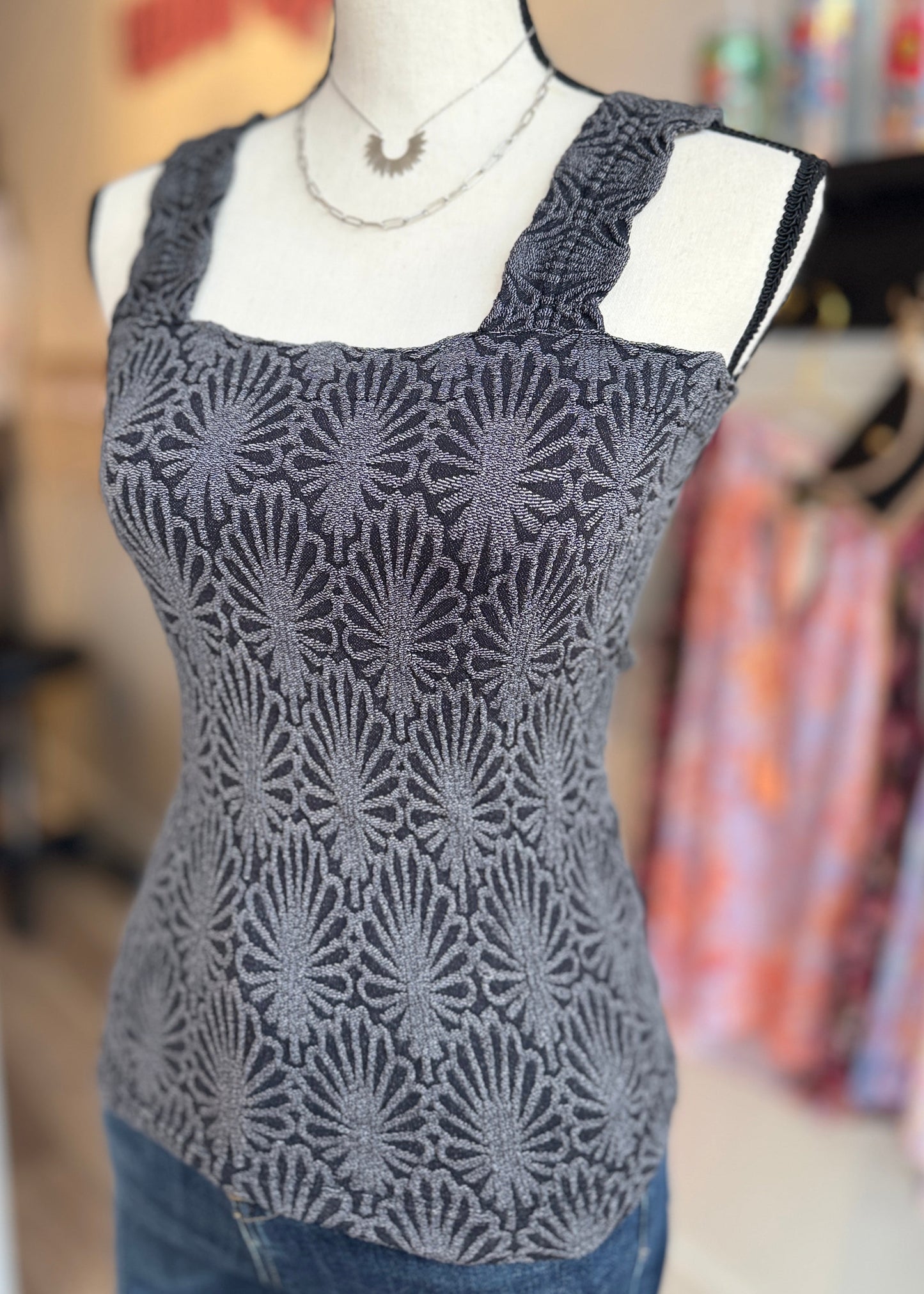 Charcoal fitted tank top with floral texture, square neckline and stretchy knit.