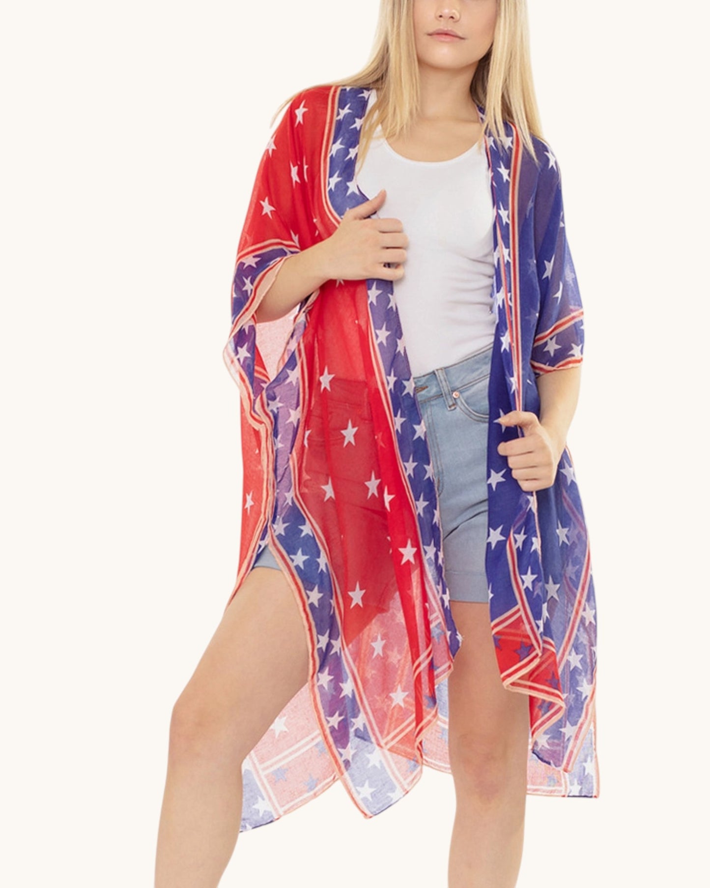 Woman wearing a red, white, and blue star-patterned kimono on a white background.